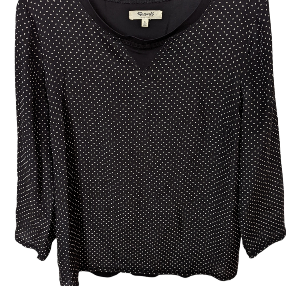 Madewell size small black and white heart sheer blouse with black back.